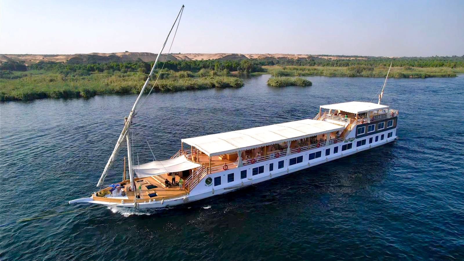Luxury Swan Dahabiya Cruise Sailing on the Nile River in Egypt